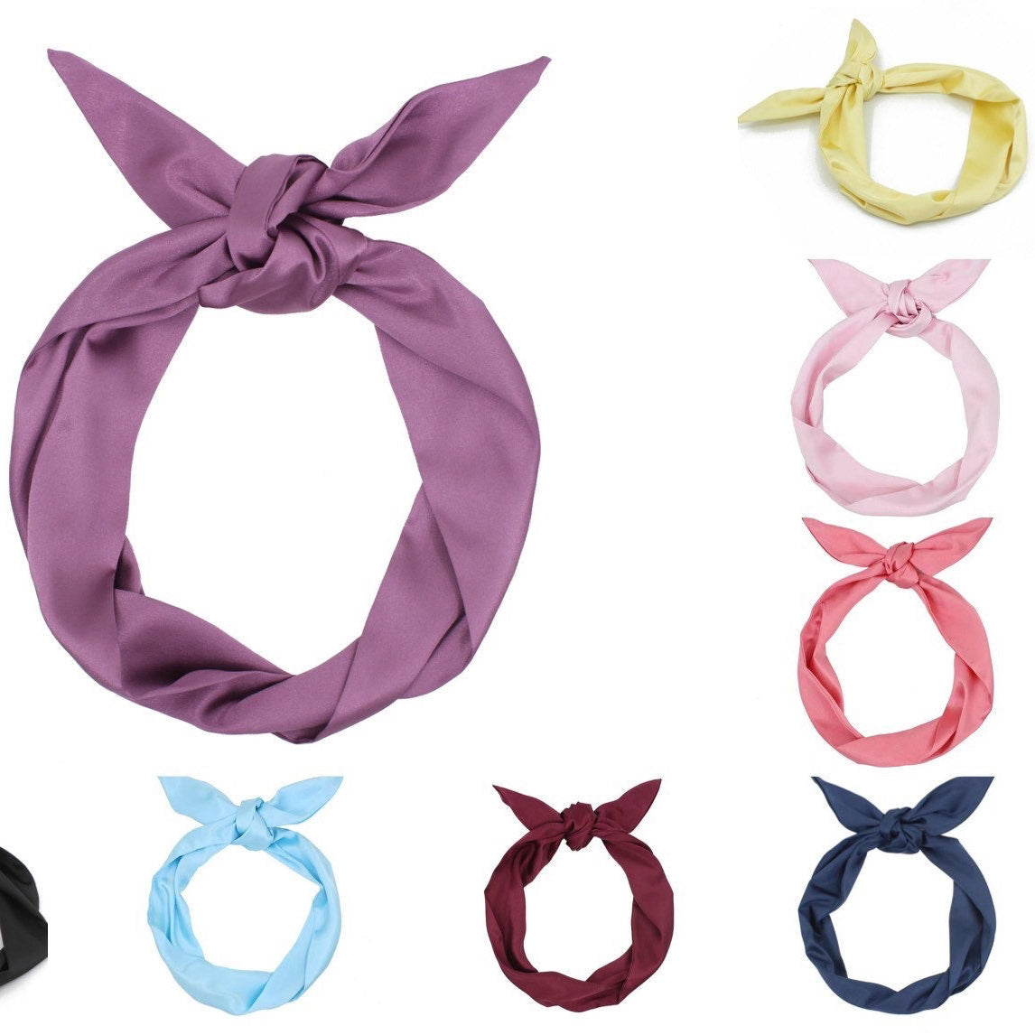 Set of colorful knotted satin headbands on a white background